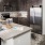 a kitchen with a marble counter