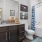 a bathroom with a tub sink and toilet