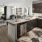 a kitchen with black cabinets