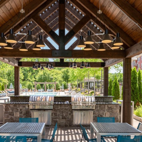Everything within reach a patio with tables and chairs