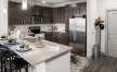 a kitchen with a marble counter